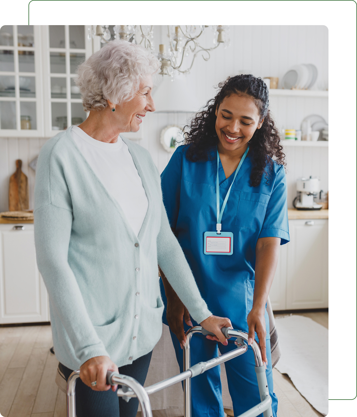 Elderly woman with nurse using walker.